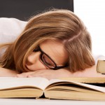 girl student sleeping on her desk