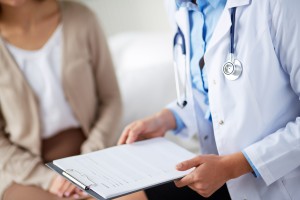 Doctor consulting with female patient.