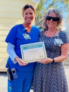 Fisherman’s Community Hospital Chief Nursing Officer Cheryl Cottrell, R.N., presented Cheryl Signor, R.N., with the hospital’s first DAISY Award