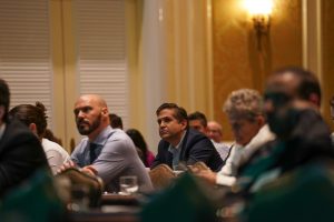 Attendees listen intently at the Inaugural Miami Cancer Institute Summit of the Americas on Immunotherapies for Hematologic Malignancies